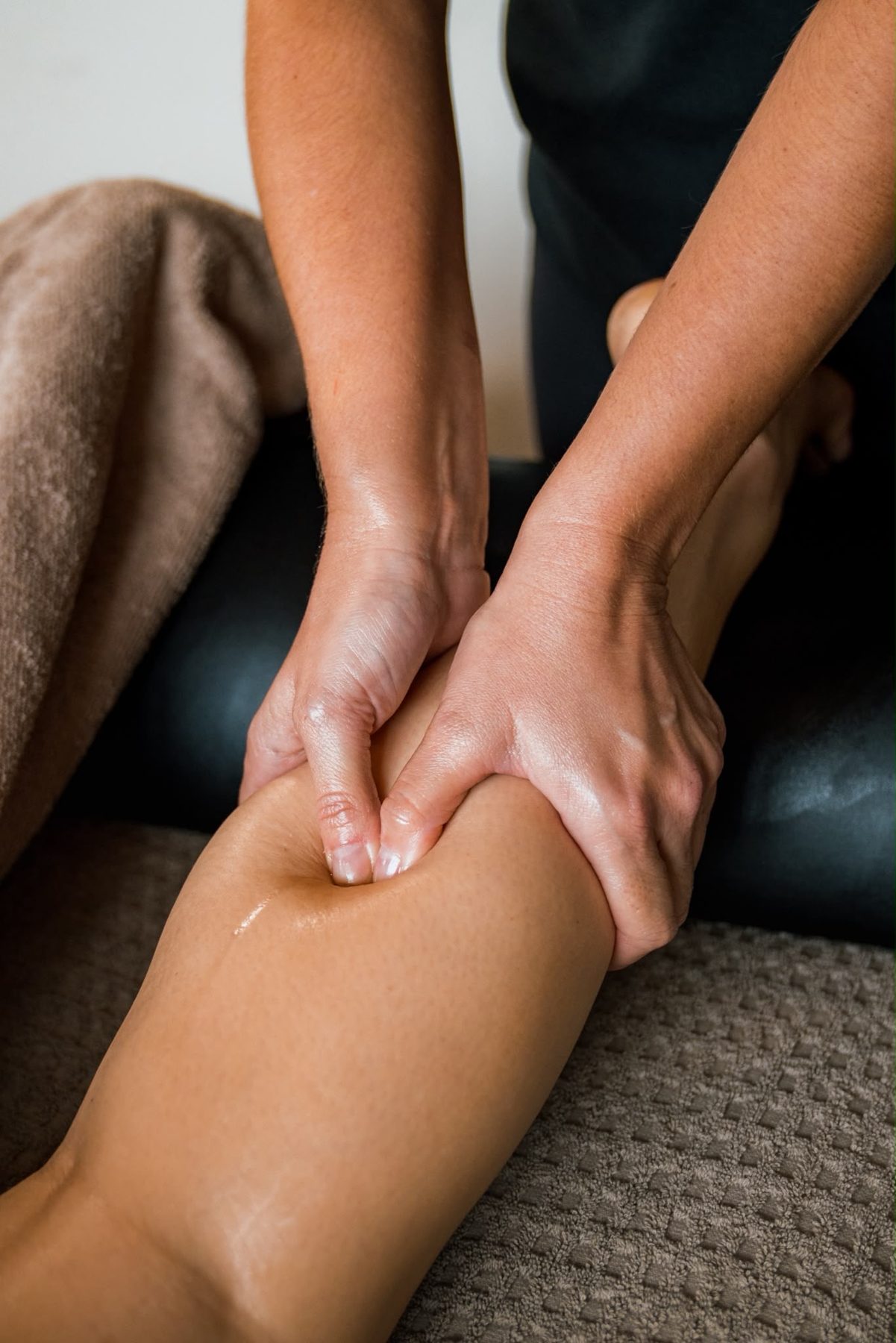 Calf massage, close up